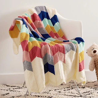 colorful chevron blanket on chair