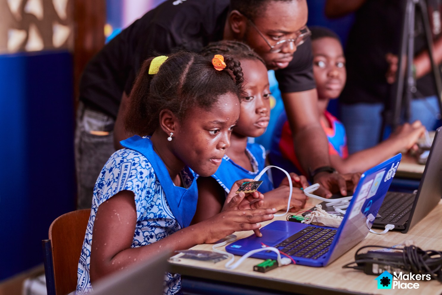 Student actively working with the micro:bit - Micro:bit Ecosystem Visit to Ghana and K12 Classroom Tour at MakersPlace - MakersPlace.io - MakersPlace Ghana.