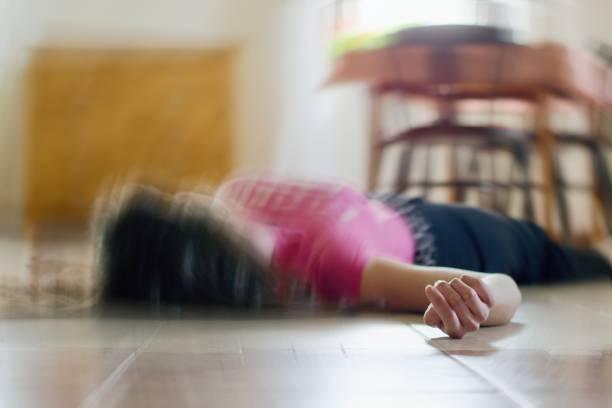 Woman lying on the floor at home, epilepsy, unconsciousness, faint, stroke, accident or other health problem. Woman lying on the floor at home, epilepsy, unconsciousness, faint, stroke, accident  or other health problem, healthcare and medical concept overdose stock pictures, royalty-free photos & images
