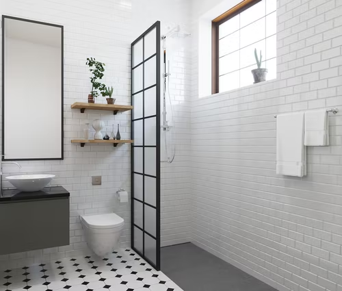 a bathroom with brick walls