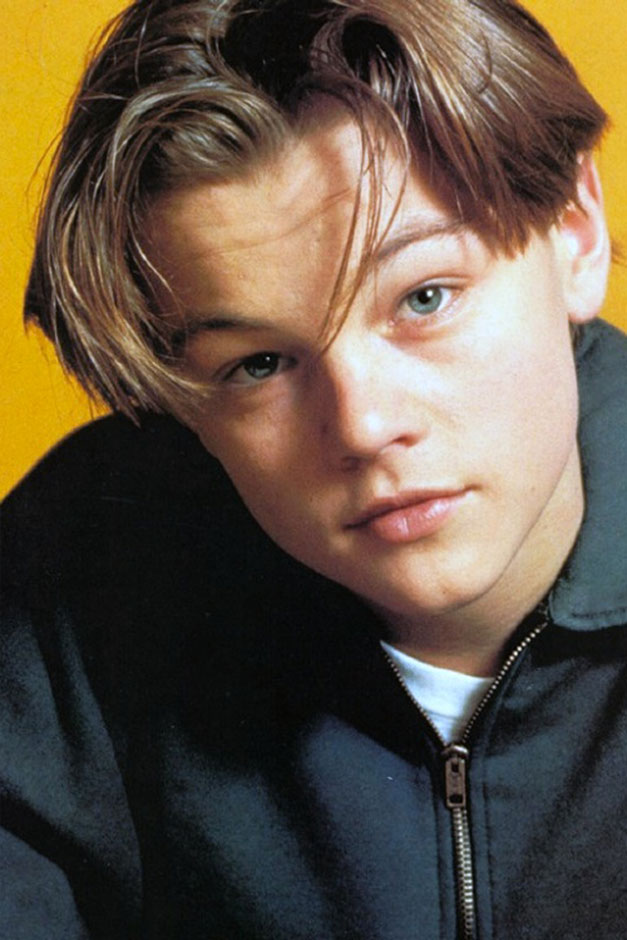 Full picture showing Leonardo di Caprio rocking the middle part hairstyle