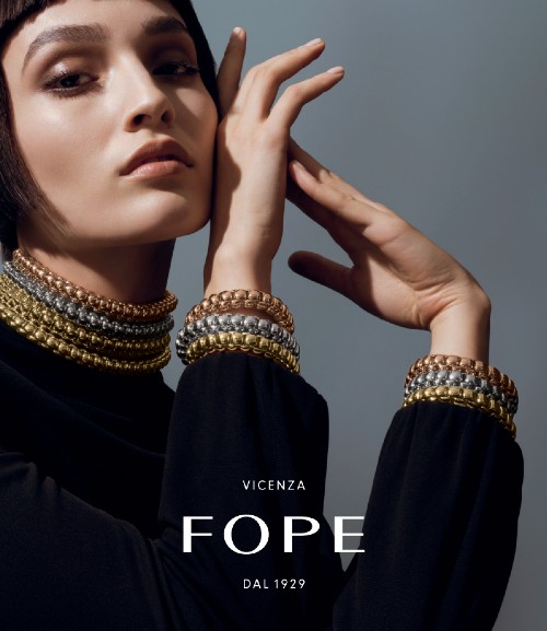 woman wearing multiple necklaces and bracelets by FOPE