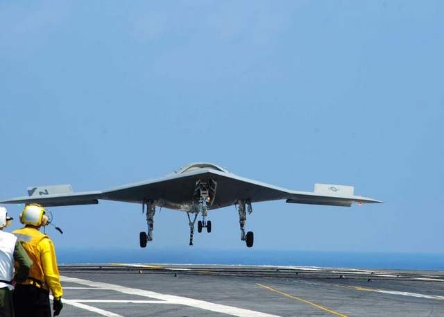 The X-47B Unmanned Combat Air System Demonstration conducts flight operations aboard the aircraft carrier Theodore Roosevelt on Sunday. The aircraft completed a series of tests demonstrating its ability to operate safely and seamlessly with manned aircraft.