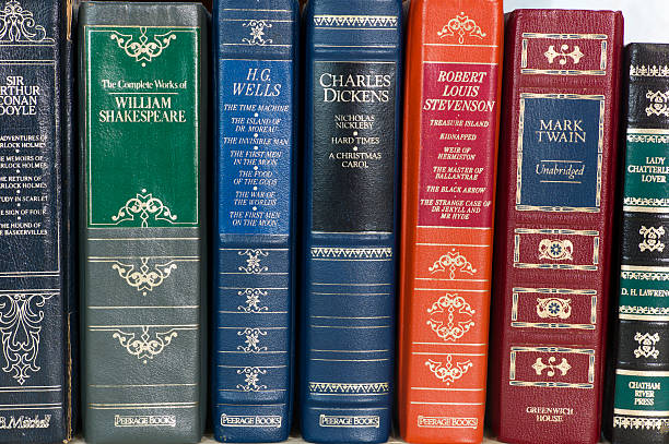 leather bound books. - charles dickens stock pictures, royalty-free photos & images