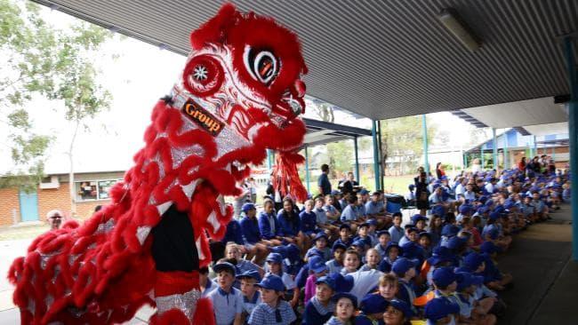 Dragon dancing at a Confucius Day celebration.