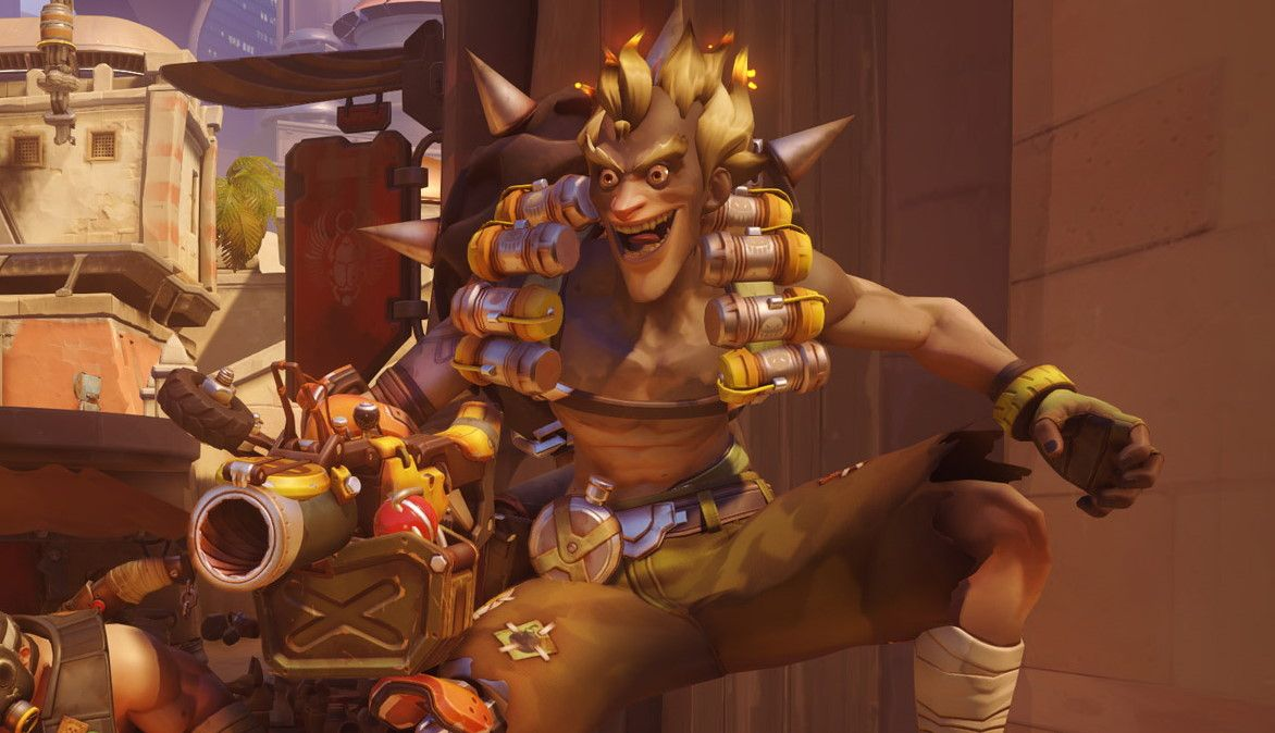 The explosives obsessed Junkrat from Overwatch 2 has a manic expression on his face whilst wielding his grenade launcher. 