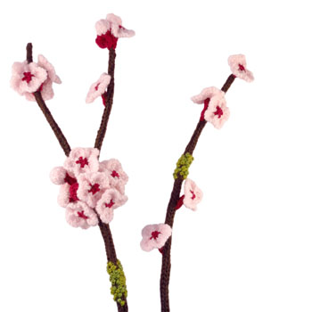 knit branches of cherry blossoms on white background