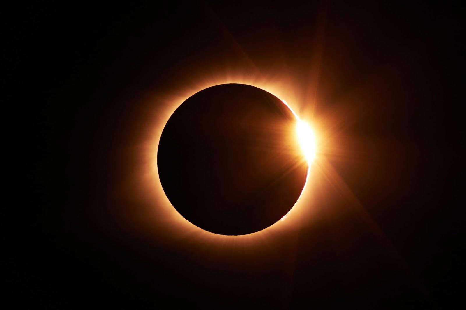 An eclipse on a black background