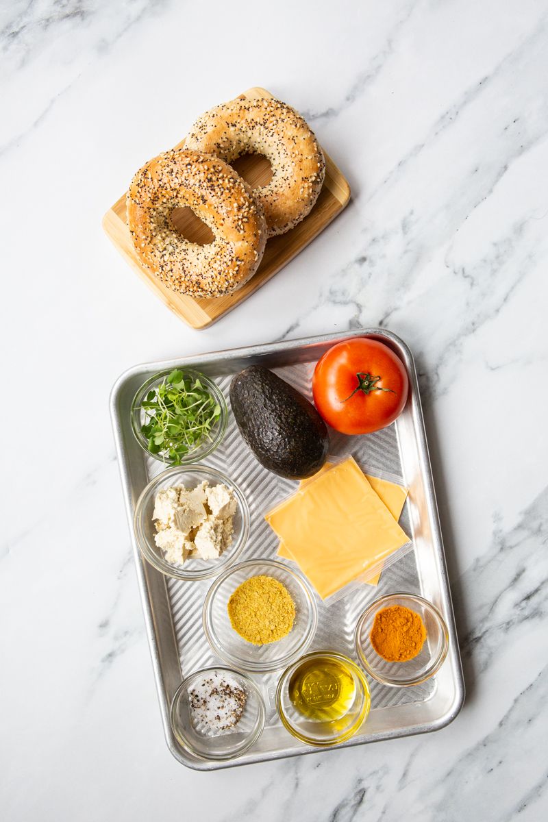 ingredients to make avocado bagel sandwich