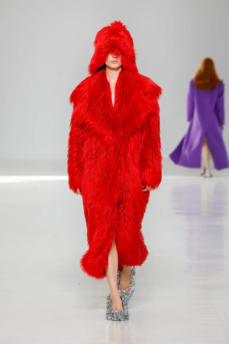 Model in gorgeous red fur looks good for MSGM