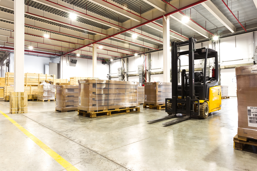 cross-docking, forklift moving pallets in a warehouse