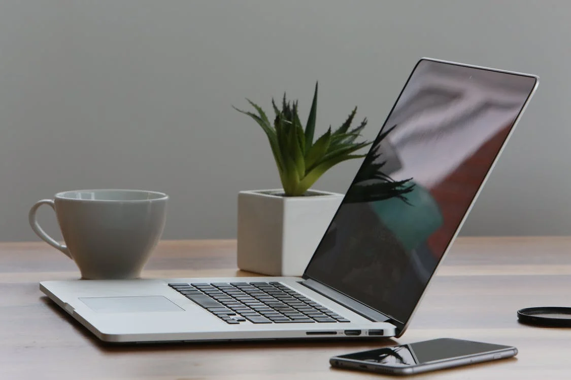 macbook and iphone at desk