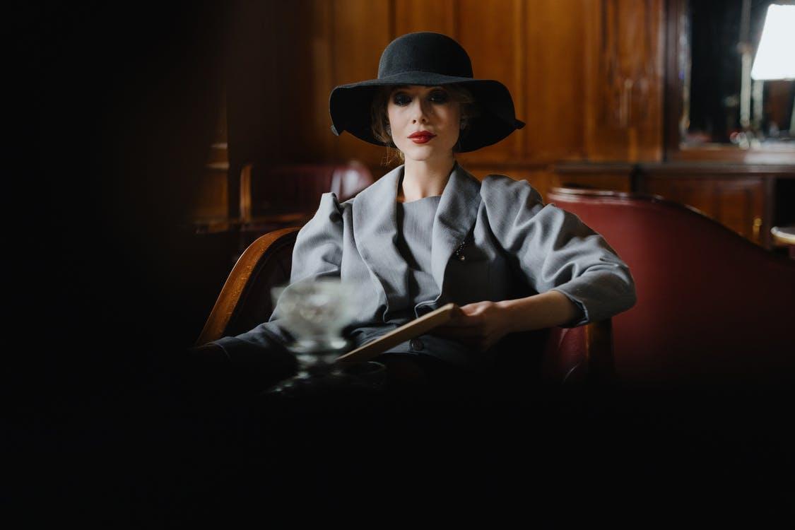 Free Elegant Woman in Gray Blazer and Black Hat Stock Photo