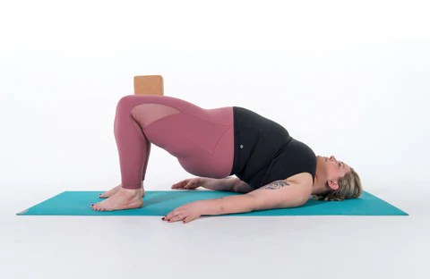 Person stretching on yoga mat
