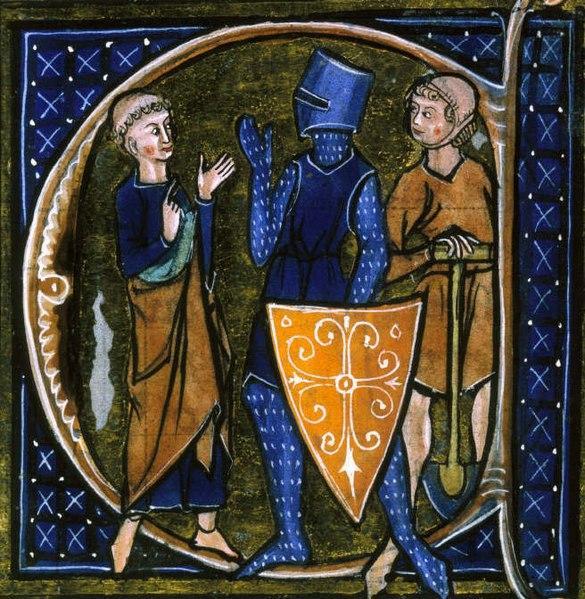 Image showing three people. One of them is wearing armor and a shield while another is holding a shovel.
