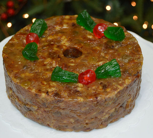 round fruitcake with candy decorations