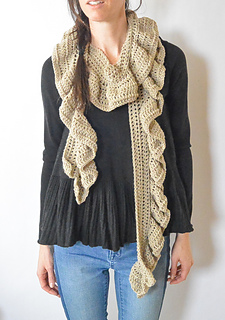 woman wearing a tan ruffled crochet scarf pattern