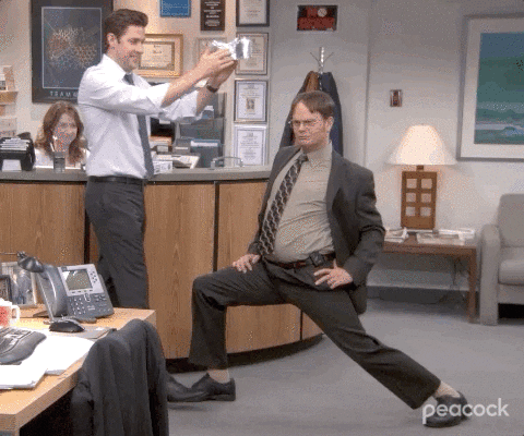 Gif of Jim giving Dwight a crown