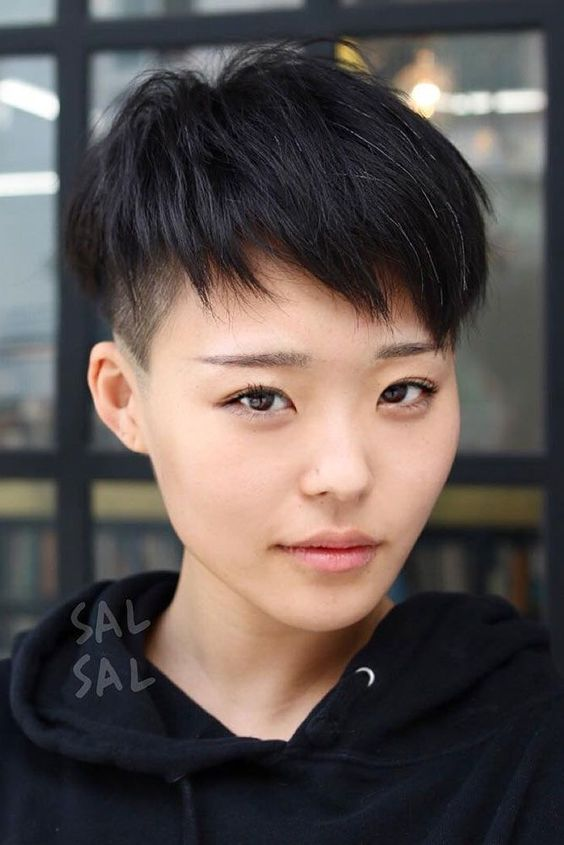 Asian lady wearing tomboy cut hair