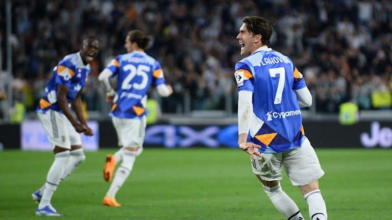 Dusan Vlahovic celebrates after equalising for Juventus 