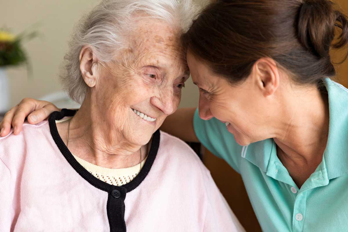 senior woman with caregiver