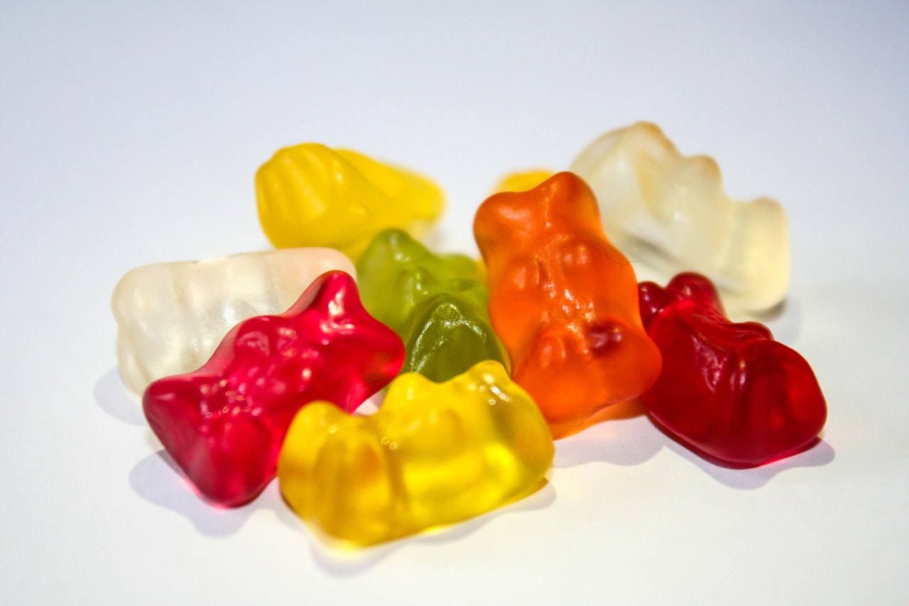 colorful gummies on a white background