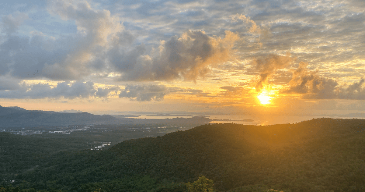 Manik Mining trail viewpoint with a sunrise in the background is one of the best viewpoints in Phuket