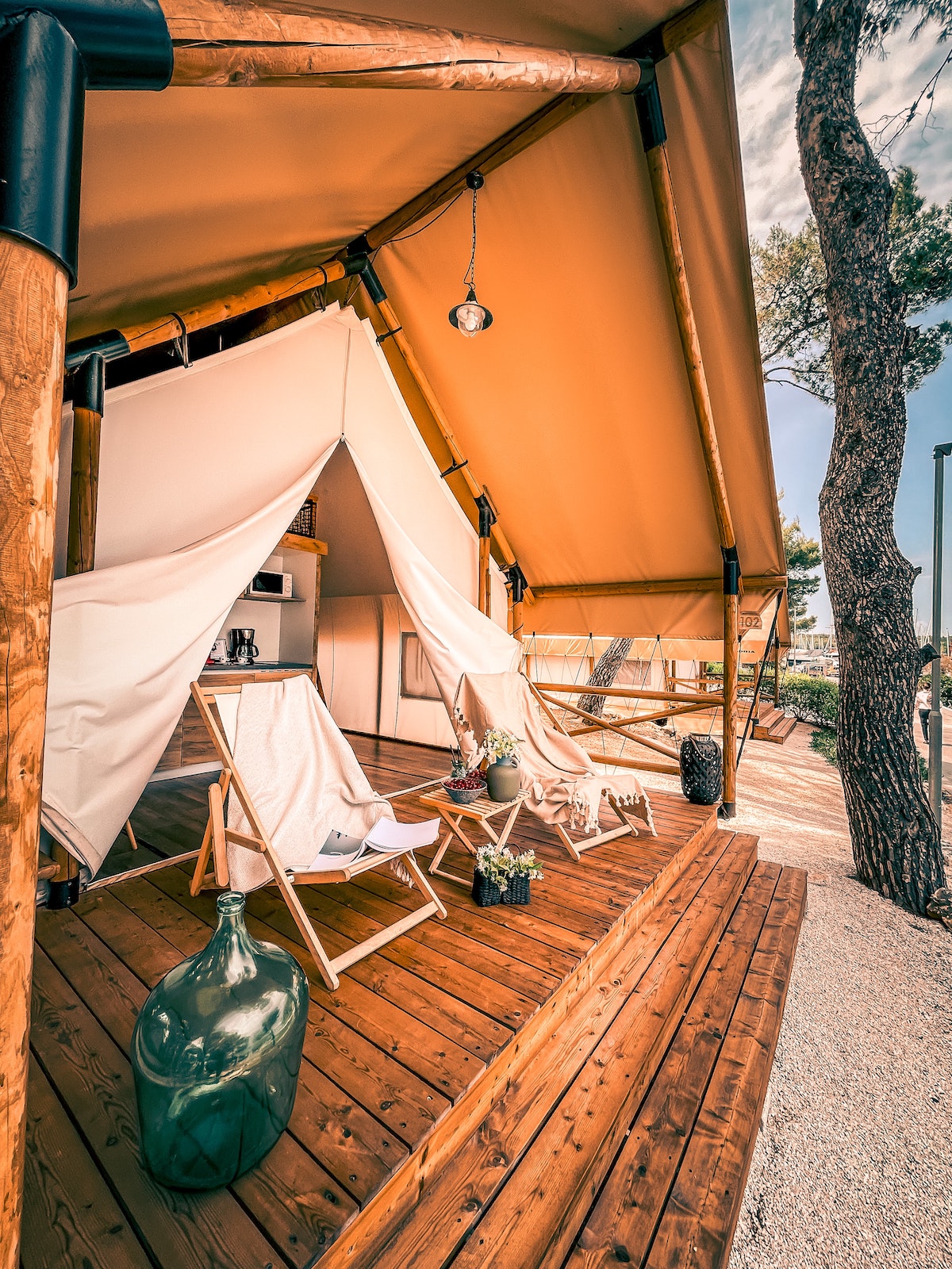Get the benefits of being in nature with nice amenities via glamping tents like this
