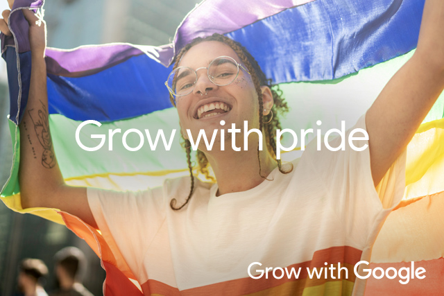 A person wearing glasses holds a rainbow flag above their head. Text reads "Grow with Pride" with the "Grow with Google" logo