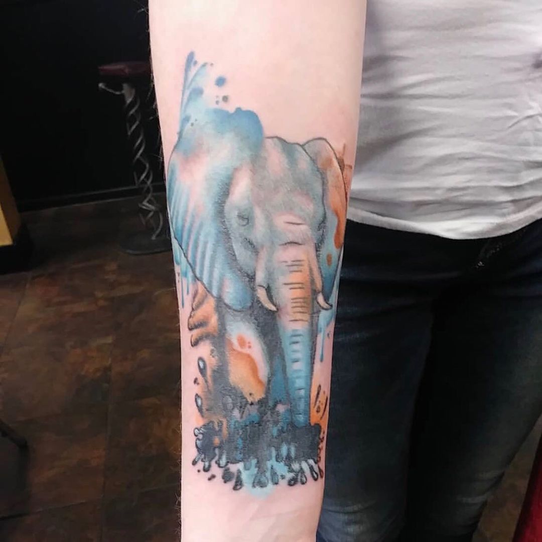 Color Splatter Elephant Forearm Tattoo