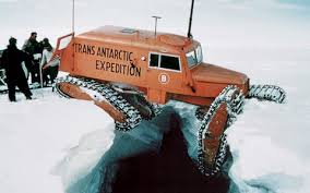 This image has an empty alt attribute; its file name is Snowcat-1.jpg