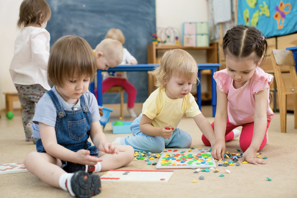 Children playing together in a daycare center