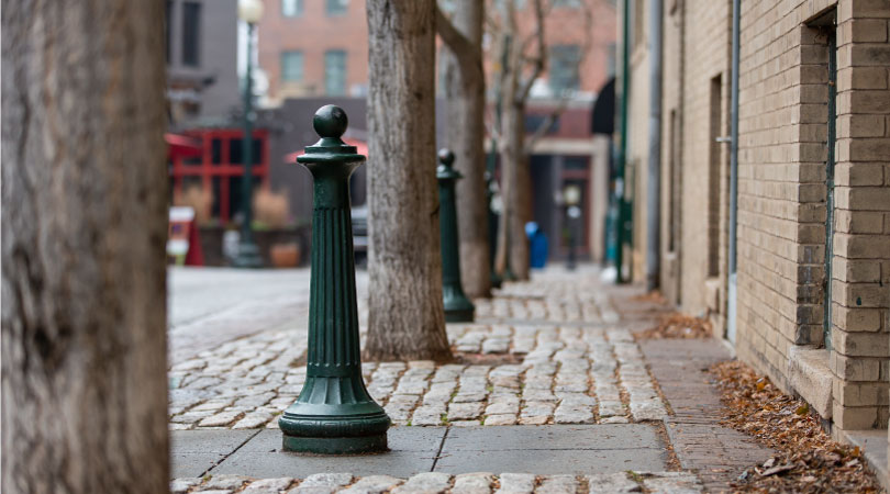 A brick sidewalk along a street in historic downtown Asheville