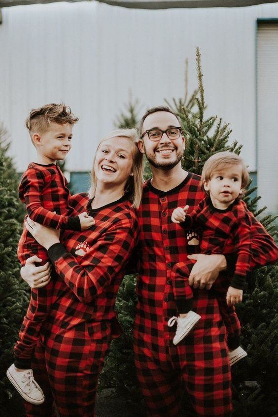 fun christmas card pose of family in pajamas