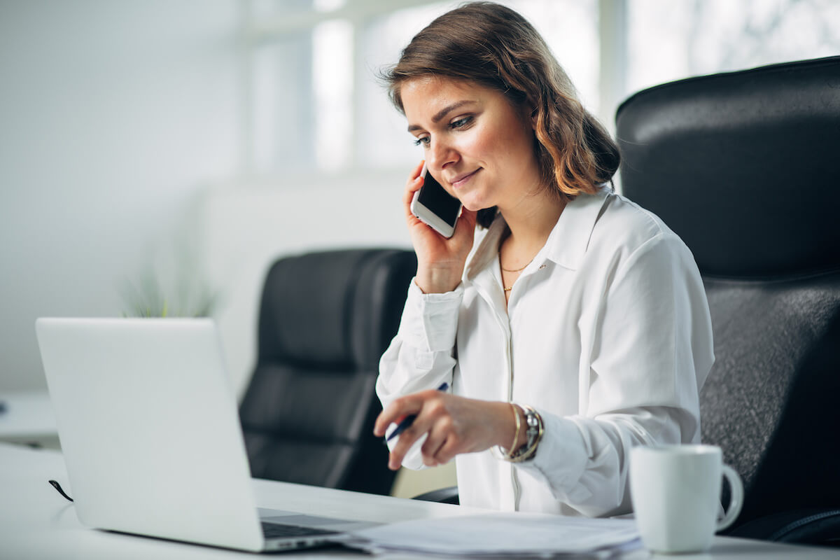 Automate HR: entrepreneur on the phone while working