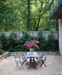 Gravel Patio. French style gravel patio with stone garden walls. Gravel  patio… | Gravel patio, Pea gravel patio, Backyard patio