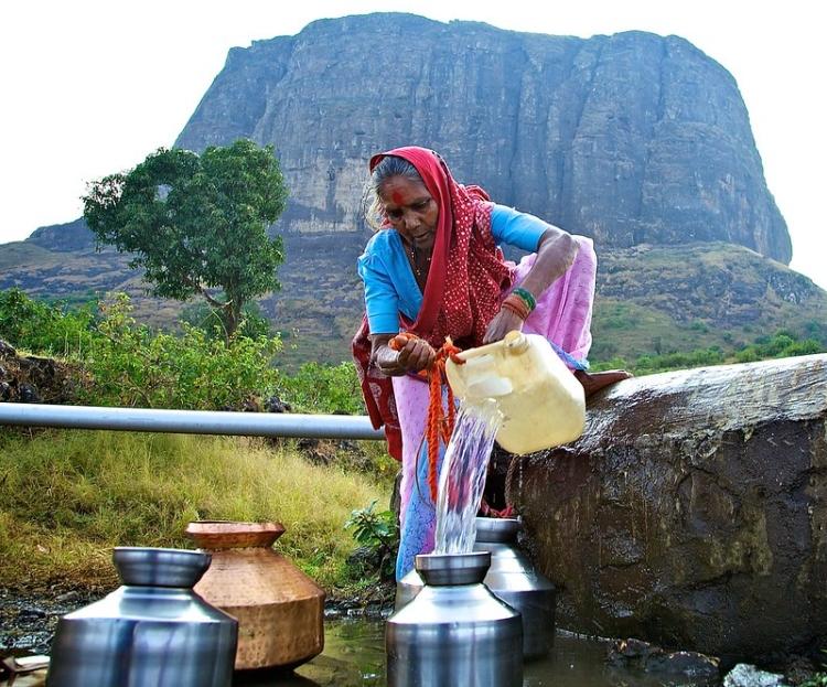 Picture of woman fetching water 