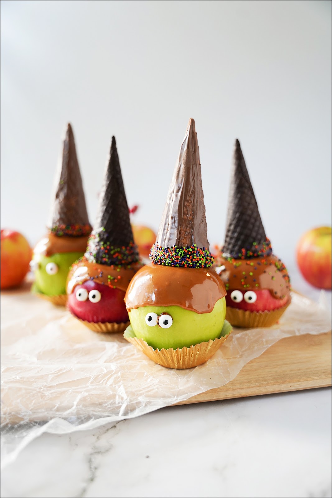 Bake your caramel apples for 3-5 minutes at    ℉. Then top with a chocolate-covered cone.
