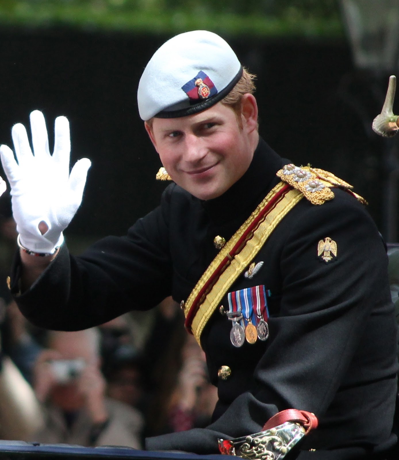 Prince Harry waving to the crowd