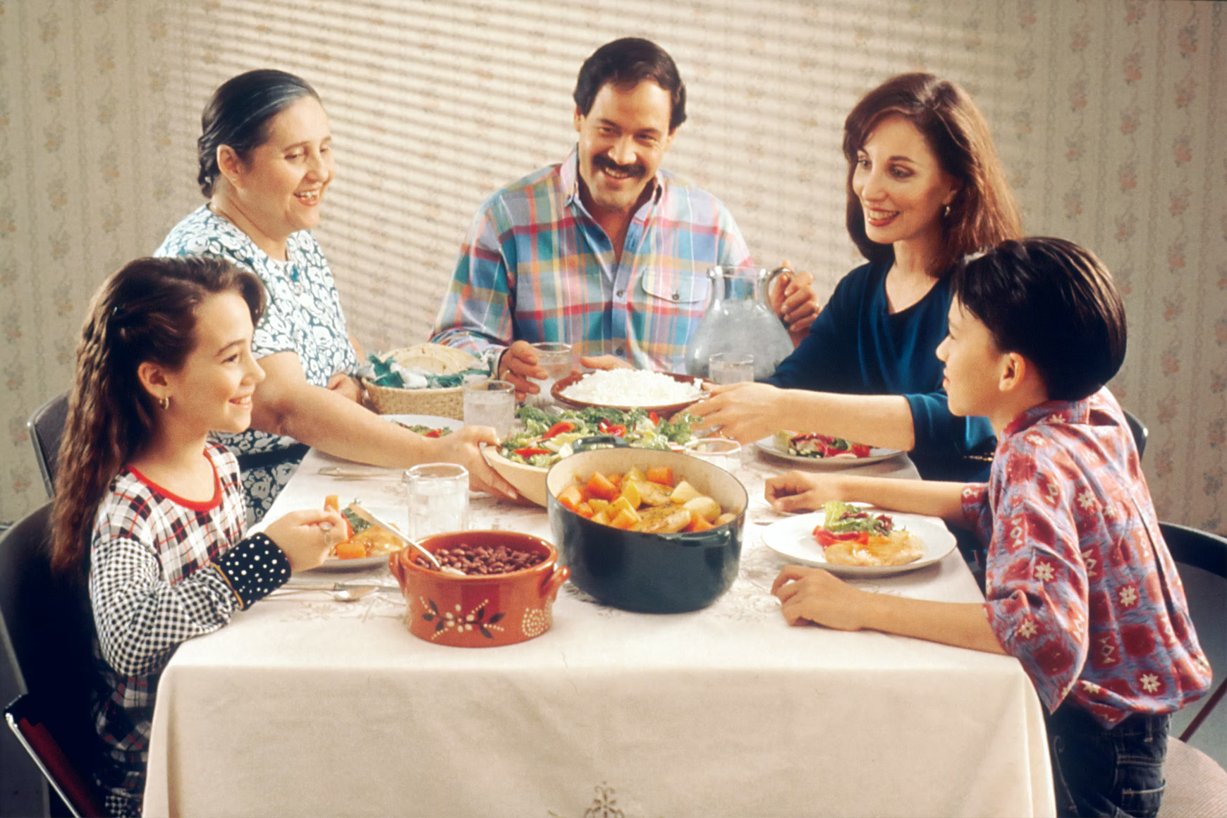 Eating dinner at the dinner table. Honor your mother and father by spending time with them