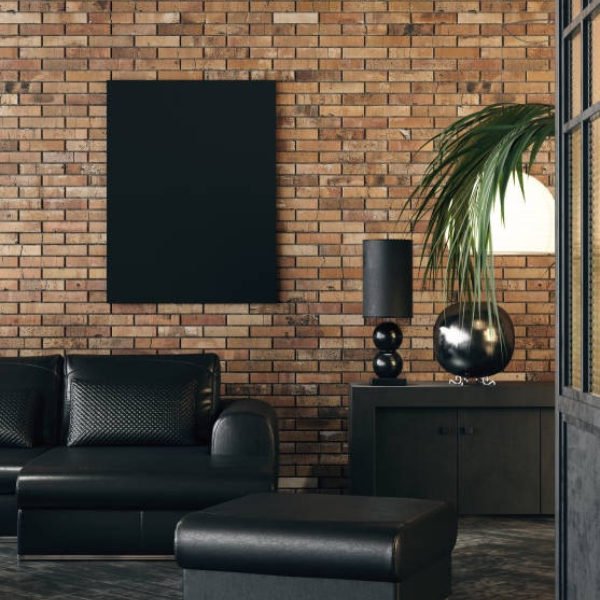 Black sofa with bricks background