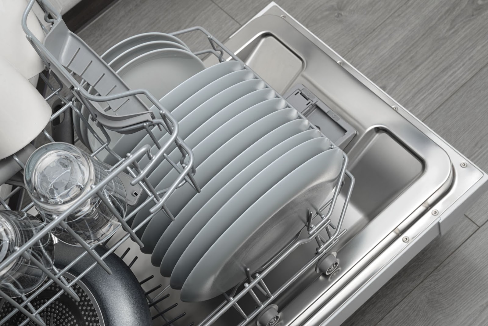 opened-domestic-dishwasher-with-cleaned-dishware