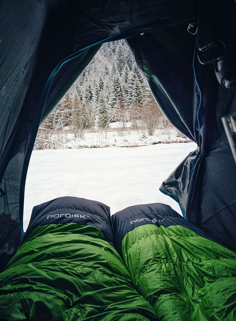 a picture of camping sleeping bags and pads