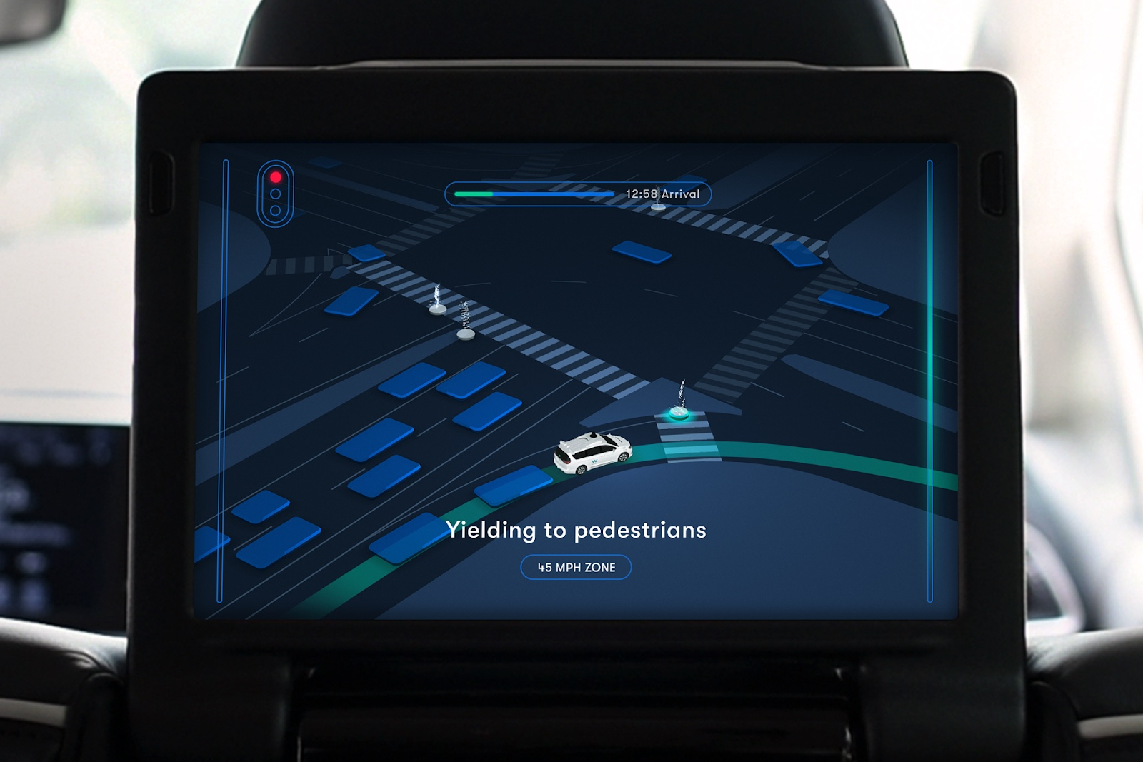 Waymo One in-car display with screen showing crosswalk navigation