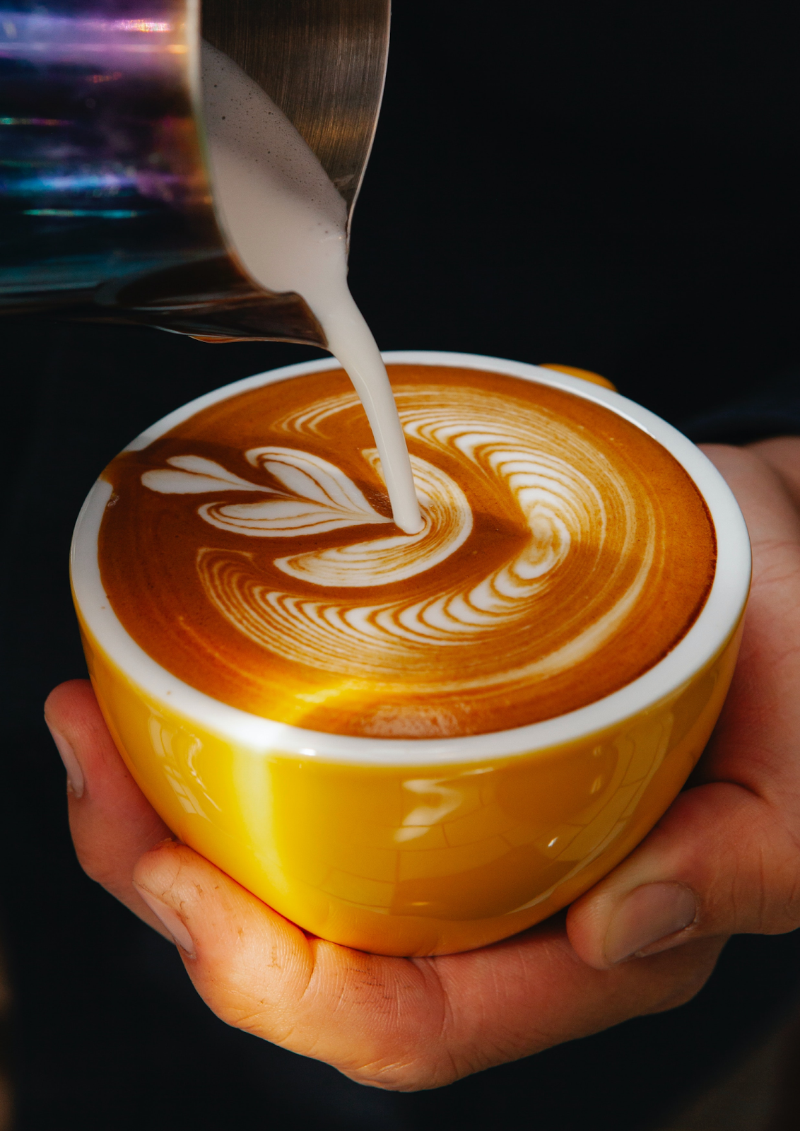 barista making coffee art