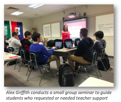 Alex Griffith conducts a small group seminar to guide students who requested or needed teacher support.