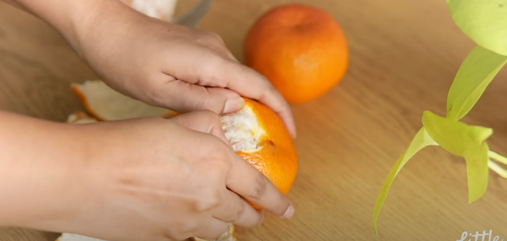easy diy turmeric cleanser and soap bar recipe, Peeling oranges