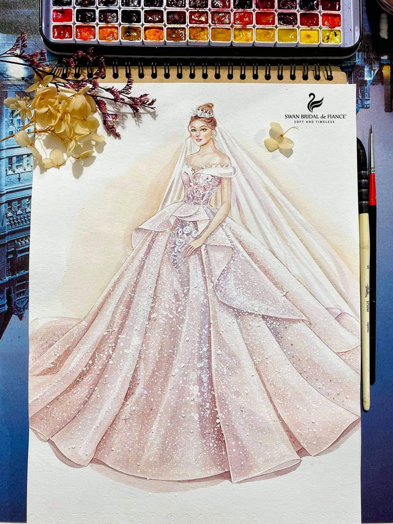 Thiết kế váy cưới được may đo theo số đo riêng và được thực hiện bởi chính Giám đốc Sáng tạo - NTK Chloe Chang Vũ của SWAN Bridal.   