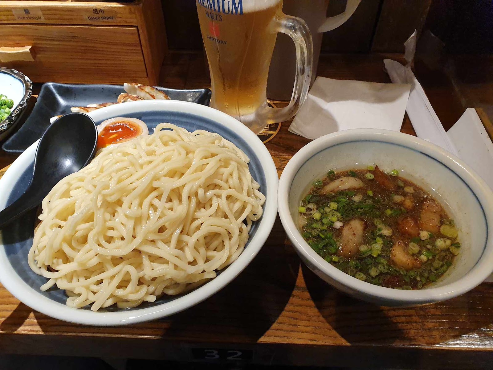 Shugetsu tsukemen noodles with dipping broth and ice cold Suntory Premium draft beer