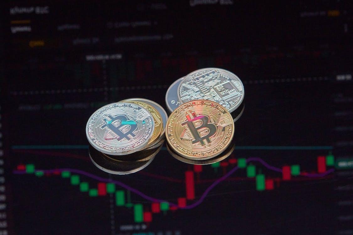 Free Crypto Coins on Black Blur Background Stock Photo